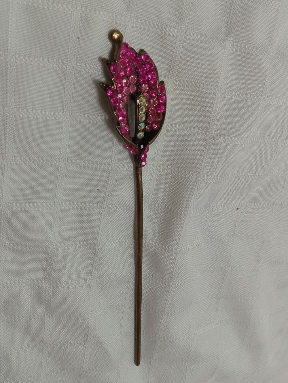 Antique brass floral hairpin adorned with sparkling pink rhinestones & details